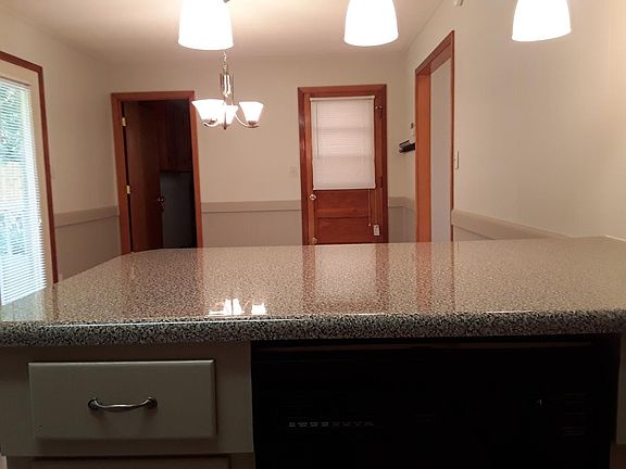 Eating counter into dining room.