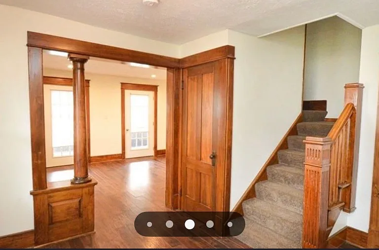 Landing area looking towards living room, side entrance just to left of photo.