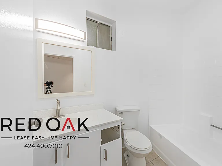 7370 Hawthorn Ave #105 — Photo 16