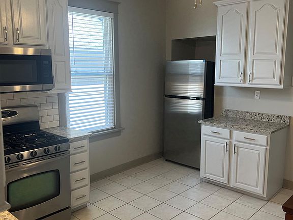 Updated Kitchen includes new appliances & granite tops
