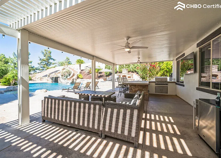 Covered Patio w/ BBQ/Refrigerator, Ceiling Fans & 65" TV