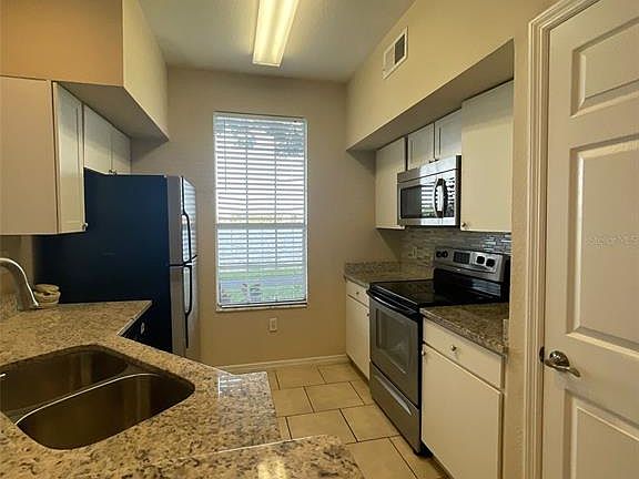 4th image of 9302 Lake Chase Island Way #9302