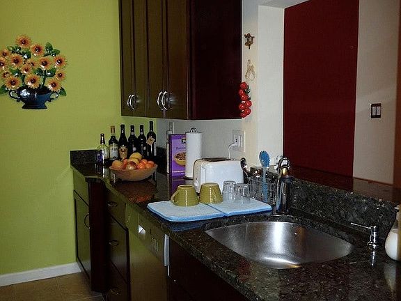 Gourmet Kitchen with granite tops and stone floor
