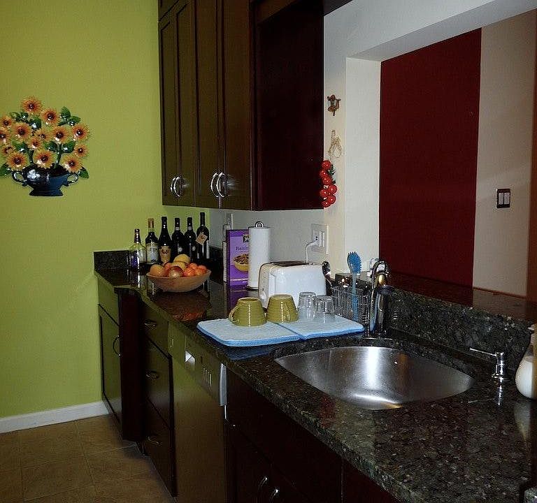 Gourmet Kitchen with granite tops and stone floor