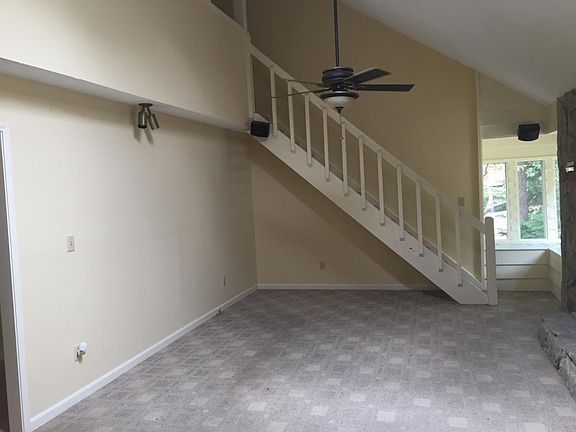 Living Room with Stairway to Loft