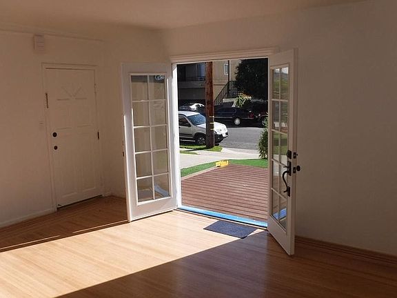 LIVING ROOM FRENCH DOORS TO FRONT YARD