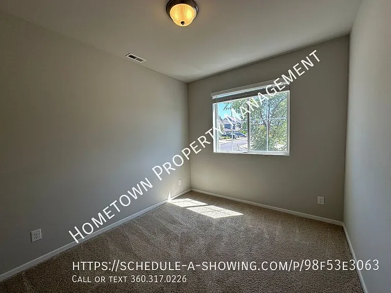 6918 Oleander Ave NE — Photo 4