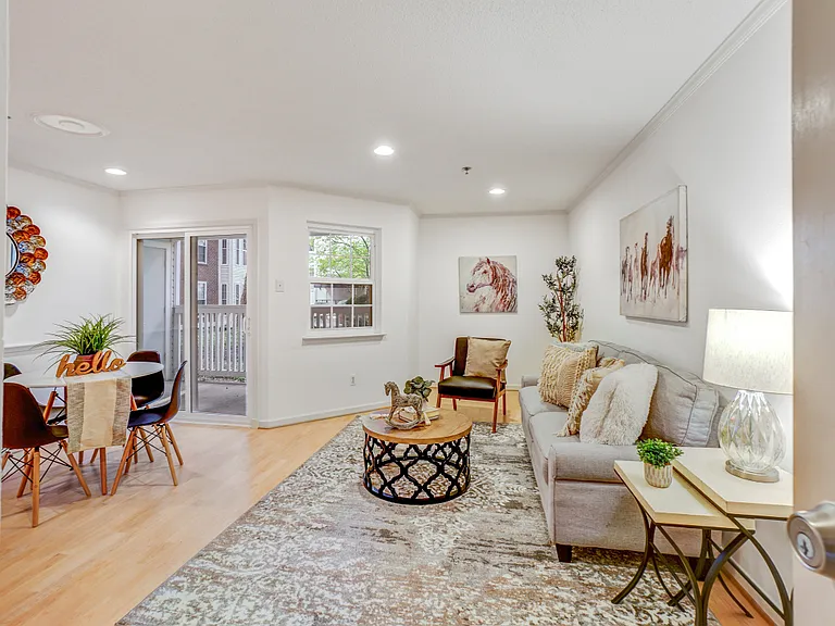 Enter a freshly painted bright living room.