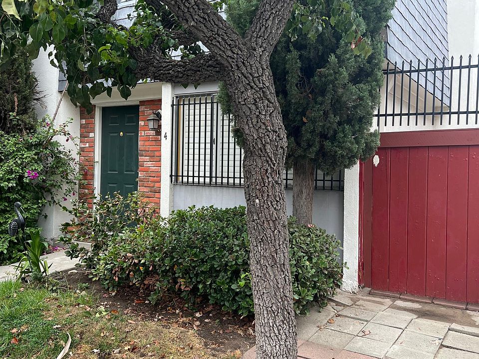 Townhome front on quiet treelined street.