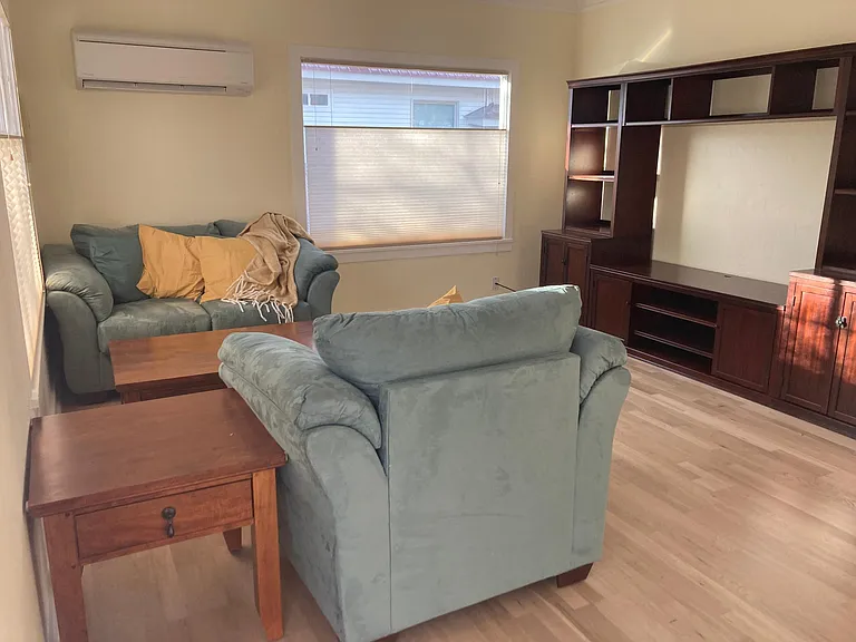 The living room is a cozy spot to lounge.