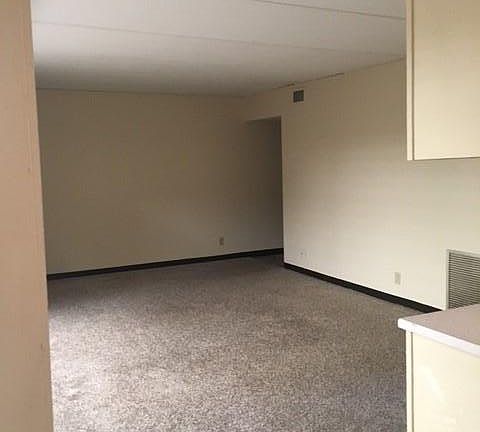 Large Living room with deck overlooking Tropical garden
