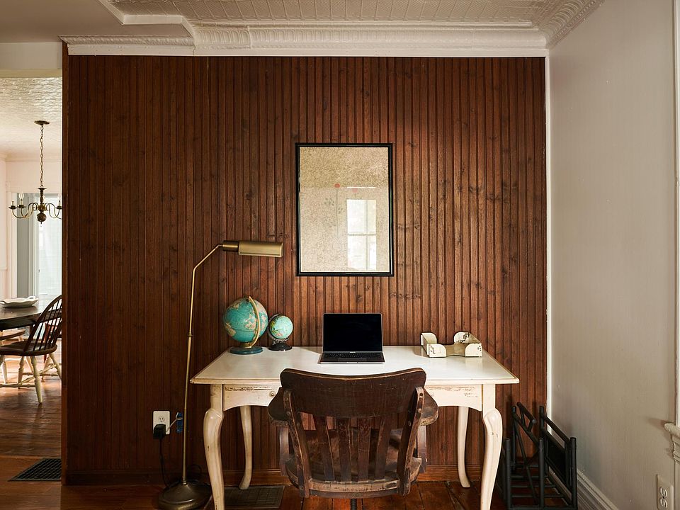 a closeup of the work area; to the left is kitchen and then the dining room, which you can see here