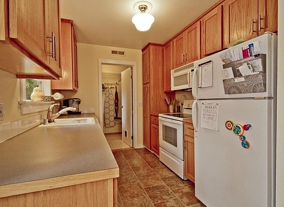 Kitchen has new appliances.