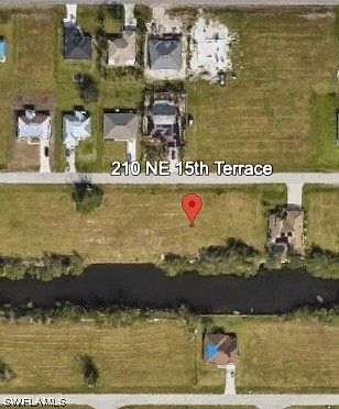 1st image of 210 NE 15th Ter