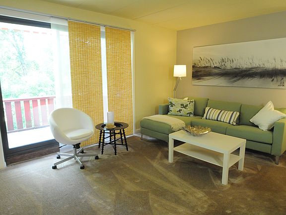 open layout living room with balcony