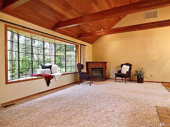 Lots of light enters through the HUGE bay window in the great room area.  The wood car decking ceiling is stunning.