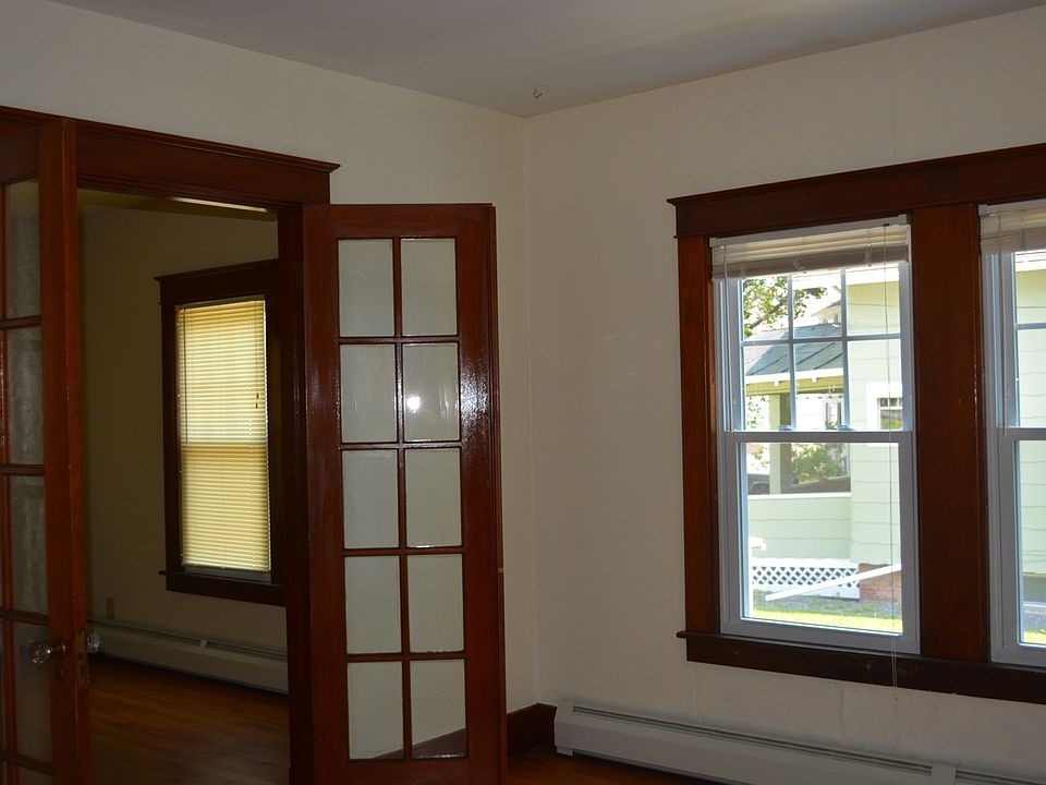 Dining room and living room is separated by french doors.6