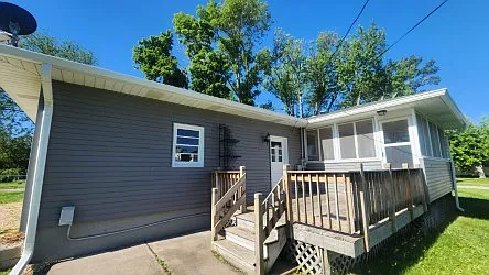 wooden deck / cement patio / 3 seasons room