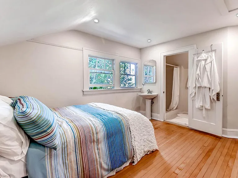 Queen Bed with Queen Trundle Bed that Rolls Out to the Left