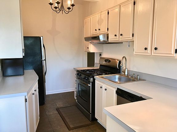 Bright kitchen with s/s appliances & gas cooking. Plenty of cabinets and counter space.