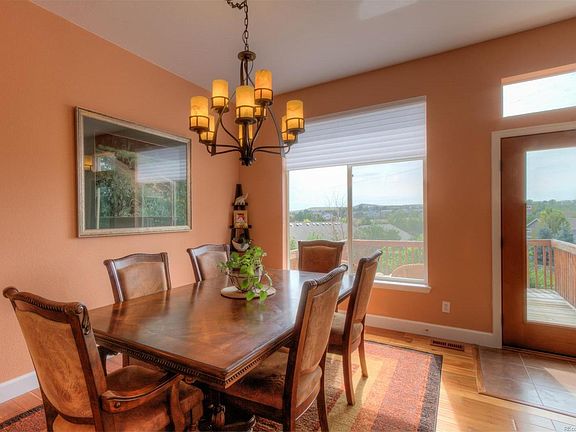 Beautiful formal dining area surrounded by the gourmet kitchen and great room wi