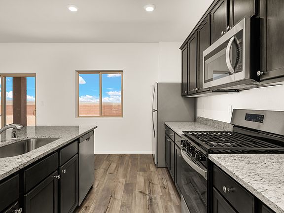 This home comes with brand-new stainless steel kitchen appliances