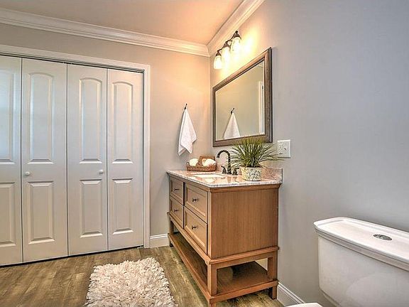 Master bathroom with shower and large closet.