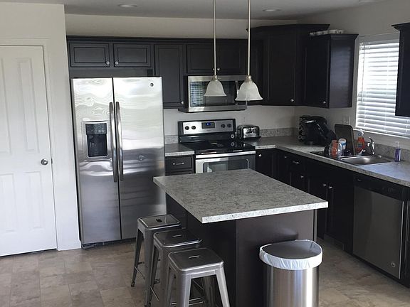 Kitchen area with island