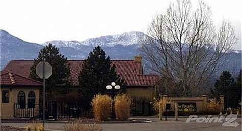 Community entry w Pikes Peak backdrop