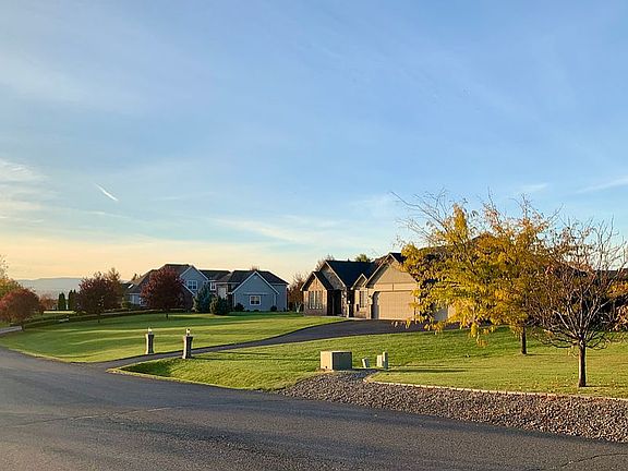 Front S & E Side of House