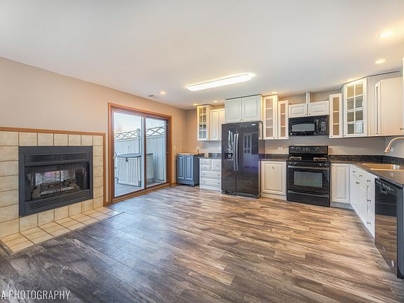 LOOKING INTO KITCHEN AND EATING AREA