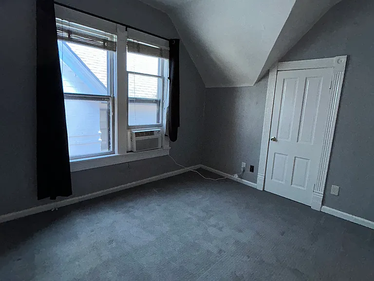 Bedroom 1, with window A/C