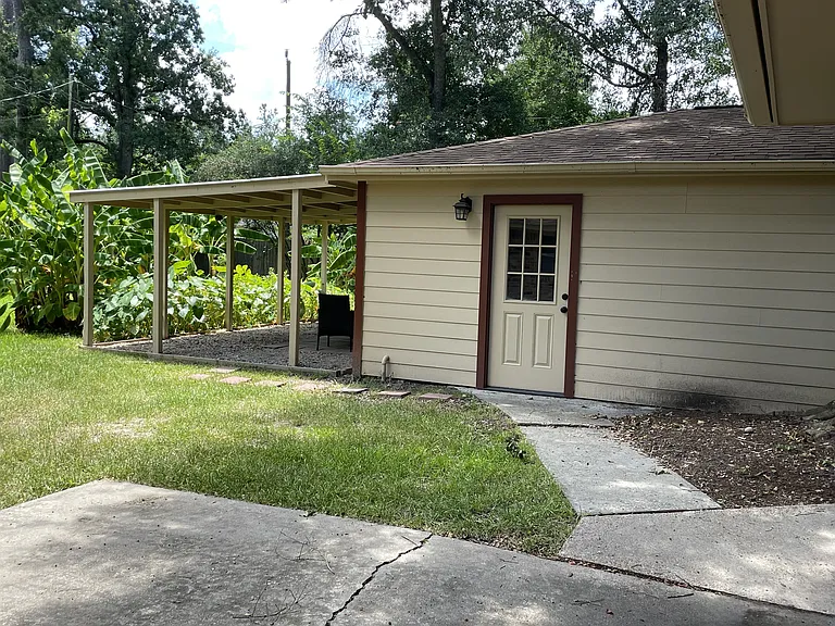 2 car garage with garage door openers. Extra deep for additional storage.