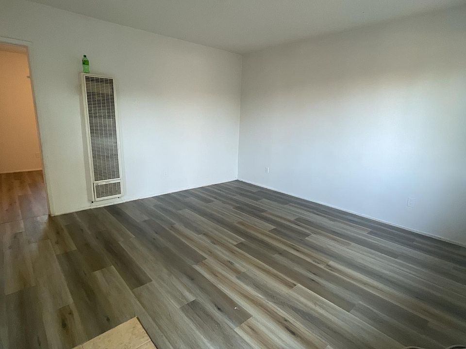 living room, hard wood floors barely put down here (: