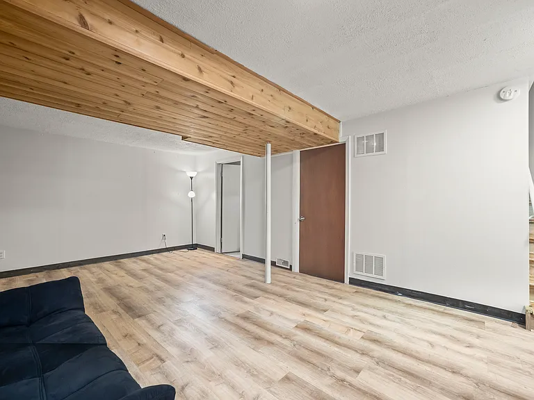 Spacious finished basement with a full bathroom and versatile bonus room, perfect for a guest suite, home office, gym, media room, or additional living space.
