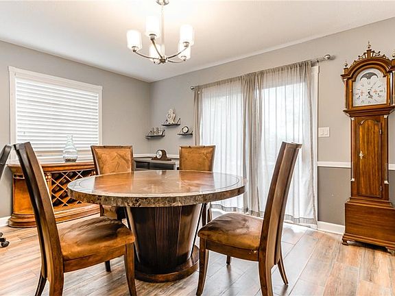 4th image of 6968 NW Chapel Woods Ln