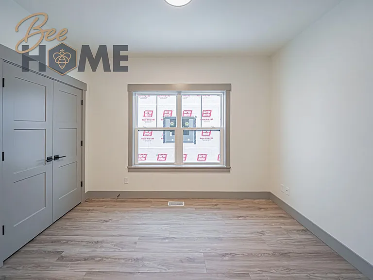 Upstairs hallway, with laundry room doors