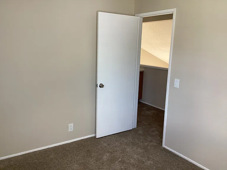 Middle bedroom facing hall.