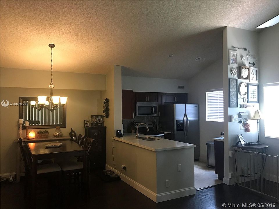 1st image of 616 Gardens Dr APT 204