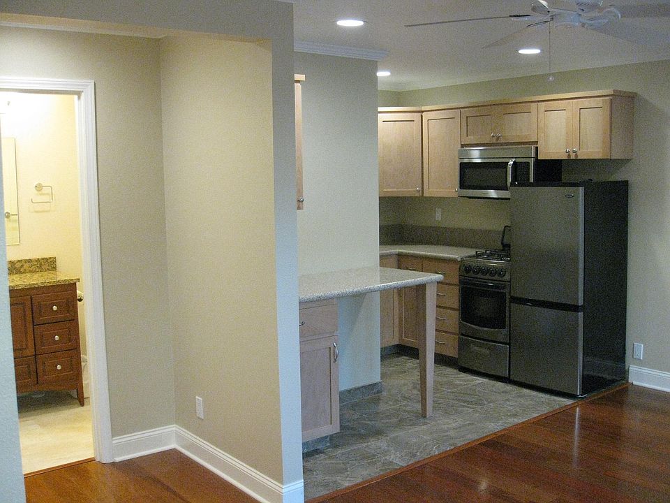 Kitchen and bathroom as seen from the corner closet
