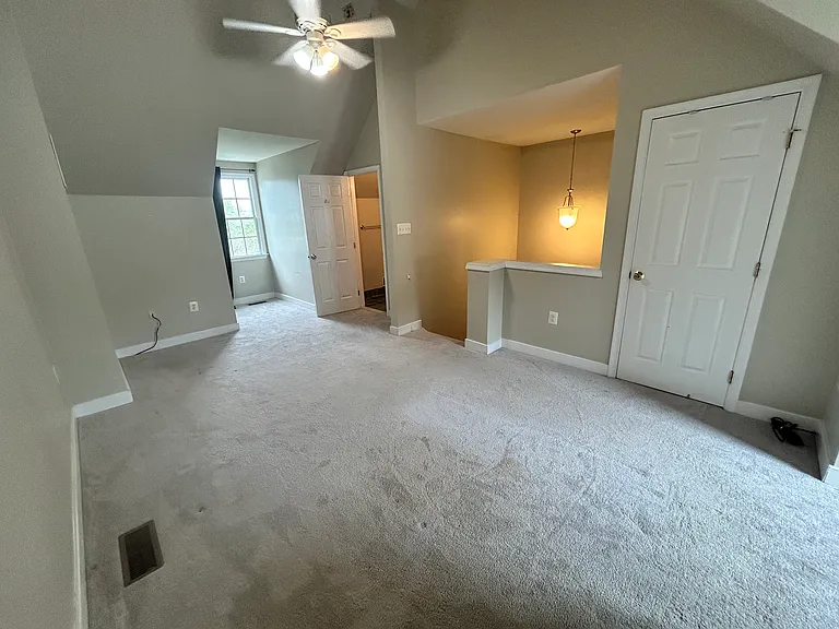 Large top-floor space -- much bigger than the photo looks, which can be master bedroom, recreation/media space, or shared office. Whatever you need! It is complete with walk-in closet, attached full bath, three storage spaces, and two nooks.