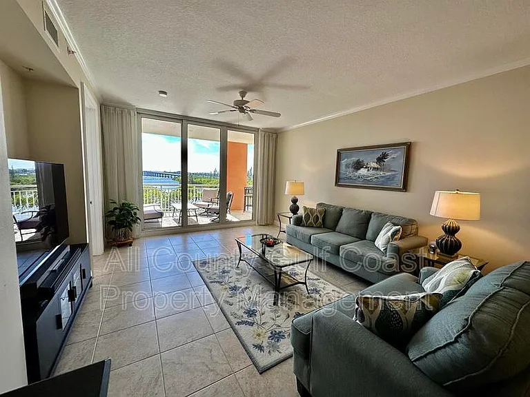 611 Riviera Dunes Way #207 — Photo 1