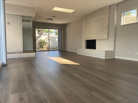 Spacious Living room with Marble Fireplace