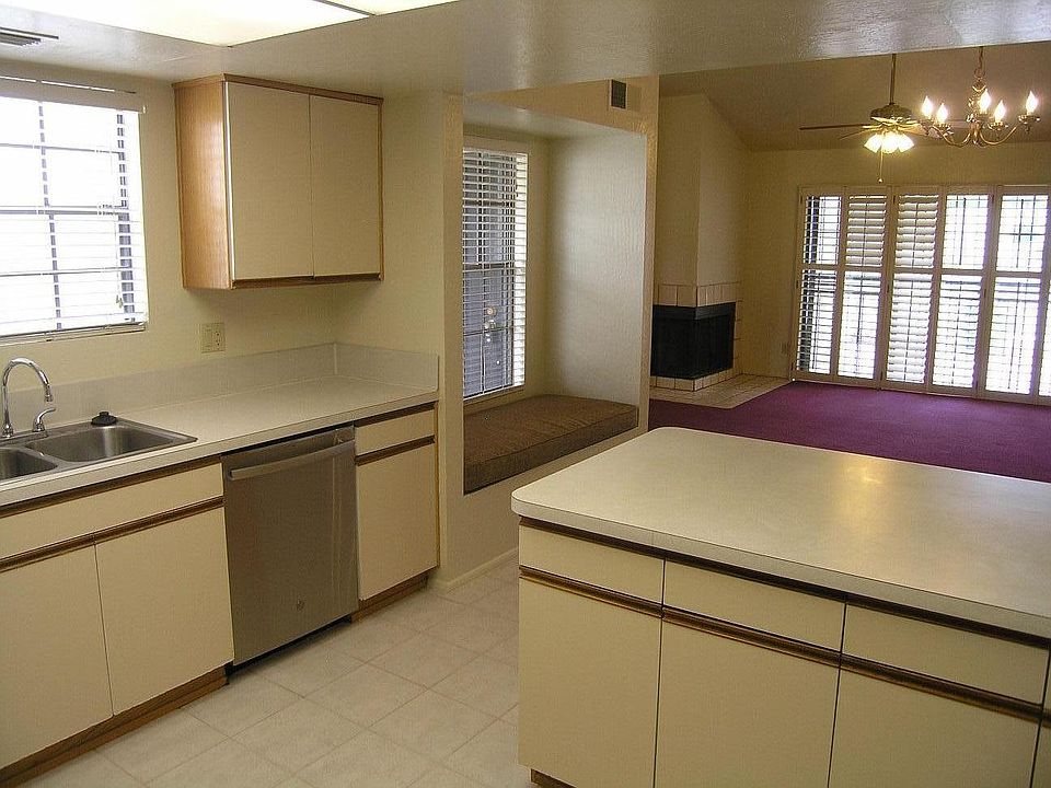 Kitchen looking to dining room and living room