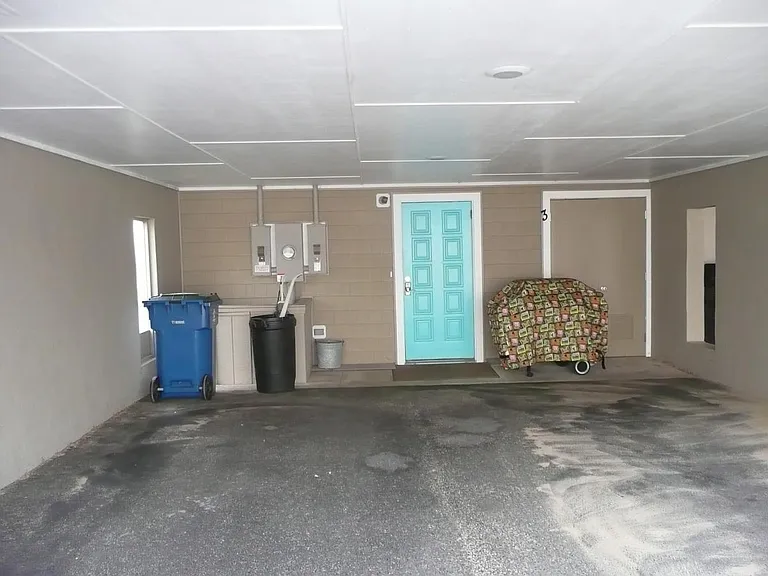 Car parking under cover for 2 cars. Also parking off-street for 2 additional cars.