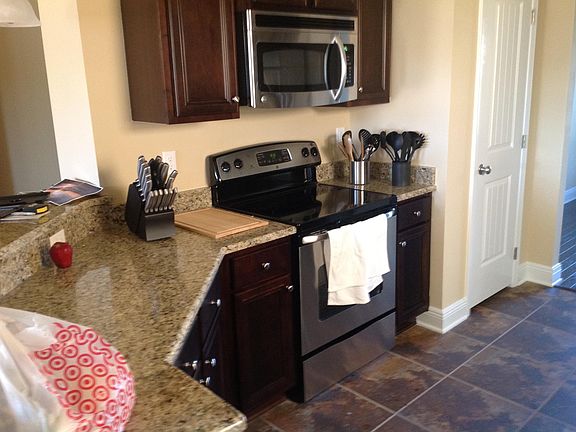 Light and bright kitchen, 1st floor has all shutter window treatments.