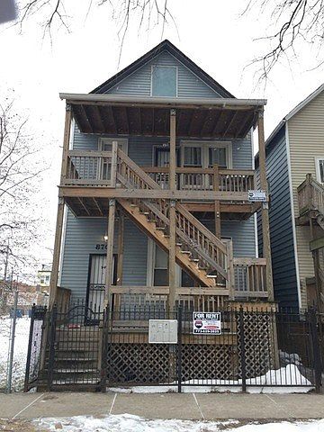 1st image of 8709 S Exchange Ave #2REAR