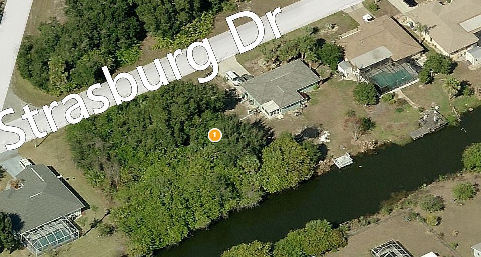 Vacant Lot surrounded by SFR
