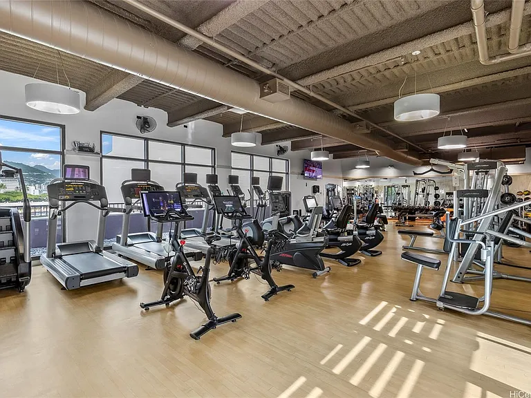 Expansive fitness center, featuring two Peleton bikes