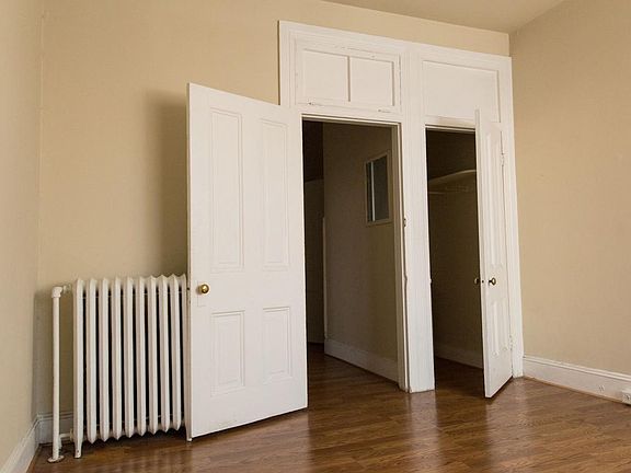 bedroom, view into hallway and closet